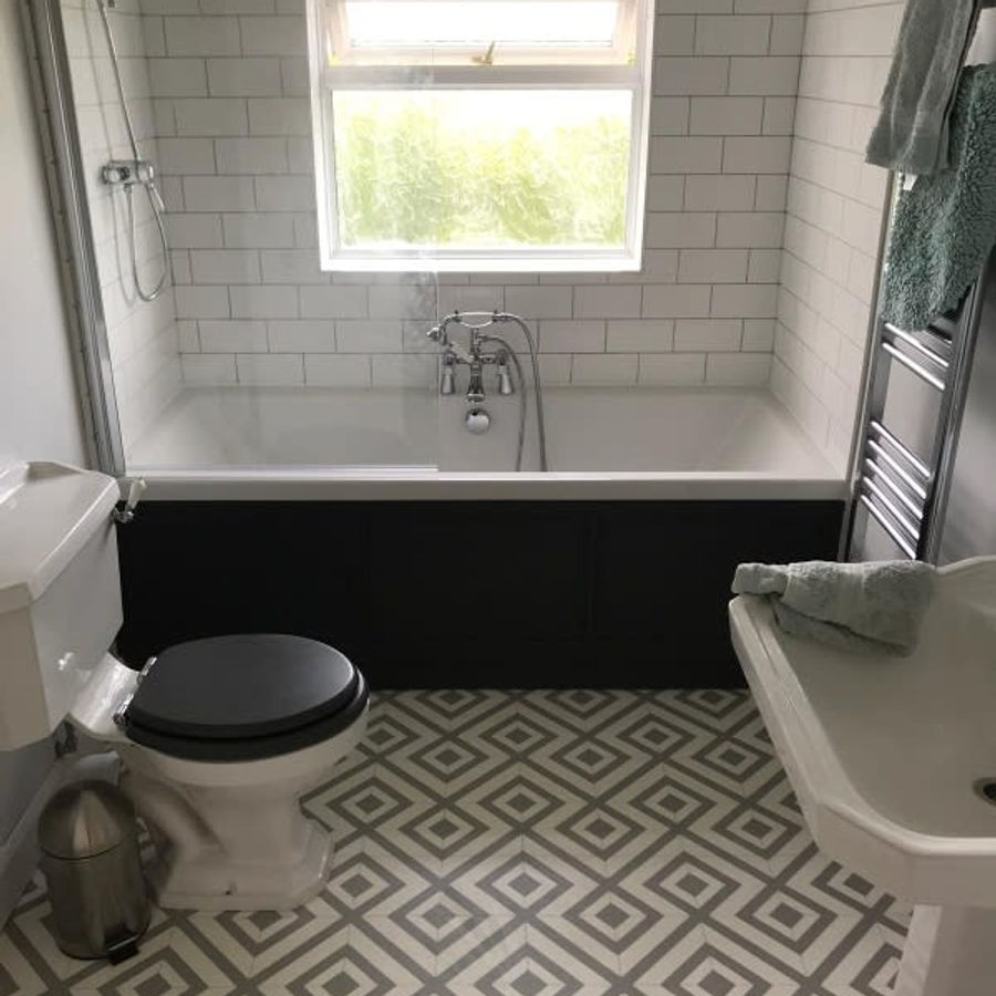 New bathroom with a geometric floor